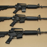 In this Aug. 15, 2012 file photo, three variations of the AR-15 assault rifle are displayed.
While the guns similar, the bottom version is illegal in California because of its quick reload capabilities. Omar Mateen used an AR-15 that he purchased legally when he killed 49 people in an Orlando nightclub. . (AP Photo/Rich Pedroncelli,file)