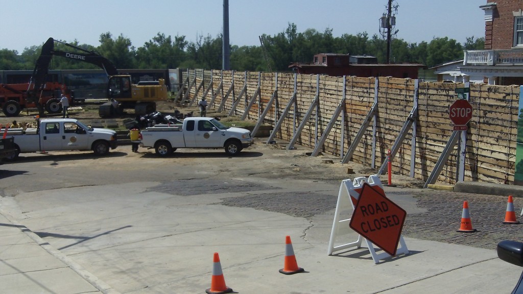 A flood wall has been constructed across railroad tracks in Vicksburg, Mississippi in anticipation of near historic flooding. Photo: Howard Greenblatt/FEMA