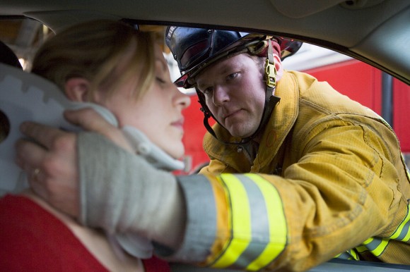 woman in wreck neck brace