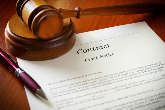 contract with gavel and pen