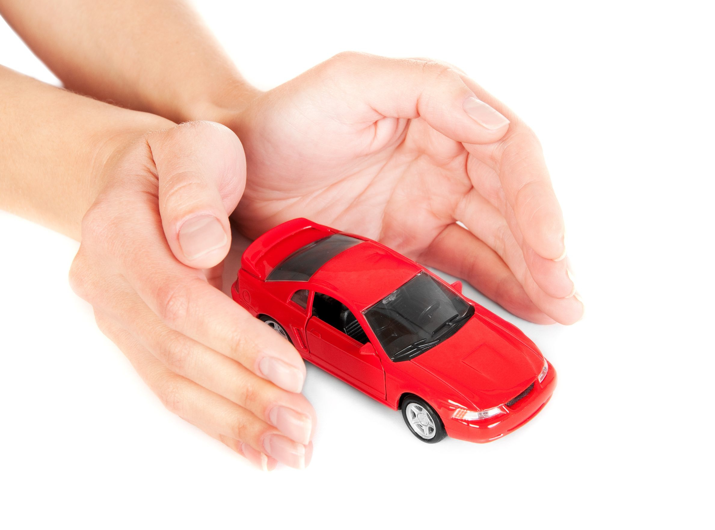Автострахование г. Страхование автомобиля. Машинка в руках. Страховка на машину. Руки в машине.