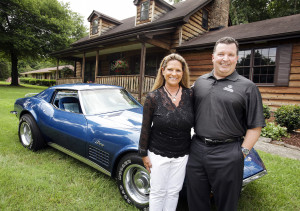 Allstate customer Terry Dietrich stands with local Allstate agency owner Chris Kemp after she is reunited with her 1972 Corvette Stingray that was stolen from her 43 years ago. Allstate recently surprised her with the car after it was found in North Carolina. (Allstate photo)