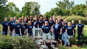 Hanson & Ryan CEO Terry M. Ryan, center, and staff at an employee appreciation day celebration in September.