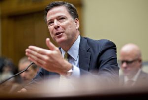 James Comey, director of the Federal Bureau of Investigation (FBI), speaks during a House Oversight and Government Reform Committee hearing in Washington, D.C., U.S., on Thursday, July 7, 2016. Comey defended his recommendation against pursuing criminal charges for Hillary Clinton over her use of private e-mail while secretary of state, testifying before Congress as he faced an onslaught of criticism from Republicans. Photographer: Andrew Harrer/Bloomberg