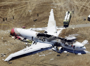 This aerial photo shows the wreckage of the Asiana Flight 214 airplane after it crashed at the San Francisco International Airport in San Francisco, Saturday, July 6, 2013. (AP Photo/Marcio Jose Sanchez)