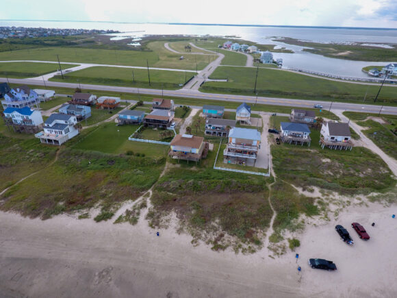 Aerial of beach houses on the ocean