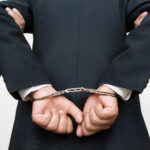 Businessman Being Arrested