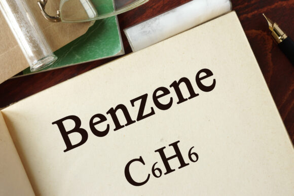 Benzene written on a page. Chemistry concept.