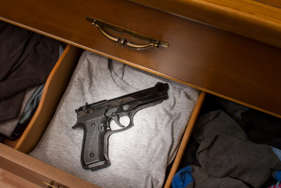 hand gun in drawer