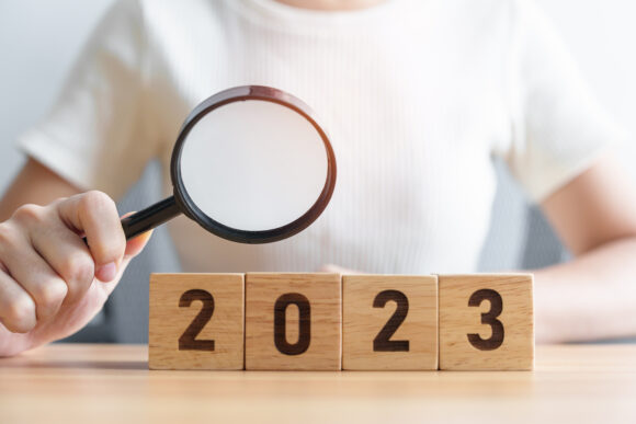 2023 block with magnifying glass. SEO, Search Engine Optimization, hiring , Advertising, Idea, Strategy, marketing, Keyword, Content and New Year start concepts