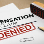 3d illustration of a worker compensation claim with a stamp denied. Disability insurance concept.