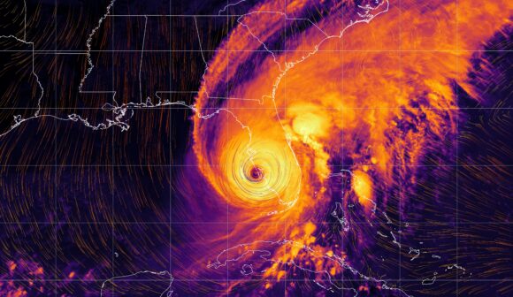 Hurricane Ian - colorful satellite weather map overlayed with wi