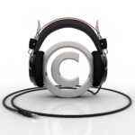 Copyright symbol wearing headphones