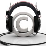 Copyright symbol wearing headphones