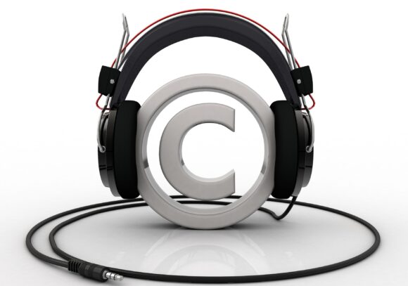 Copyright symbol wearing headphones