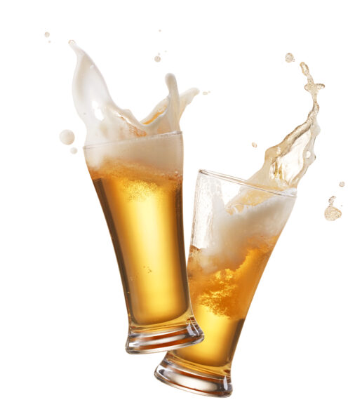 two glasses of beer toasting creating splash