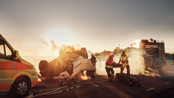 On the Car Crash Traffic Accident Scene: Paramedics and Firefigh