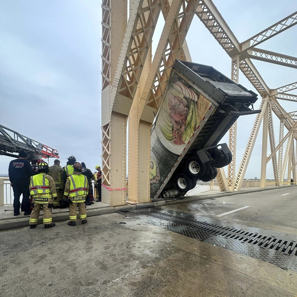 Car Strikes Truck, Sends it Dangling Off Bridge in Kentucky