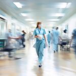 Emergency Treatment: Blurred Hospital Scene with Nurses, Patients, and Medical Care