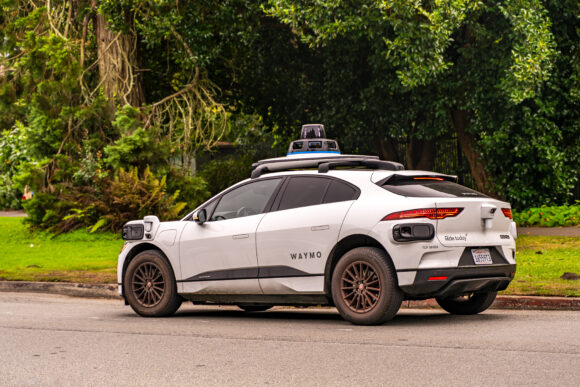 Waymo self driving taxi driving in downtown San Francisco