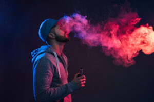 Vaping flavored e-liquid from an electronic cigarette