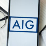 New York, USA - 21 June 2024: American International Group Logo on Phone Screen, AIG Company Icon.