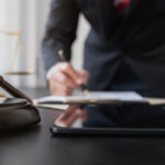 Professional lawyer considering with contract papers in courtroom. Justice, Law, Attorney and Court judge concept.