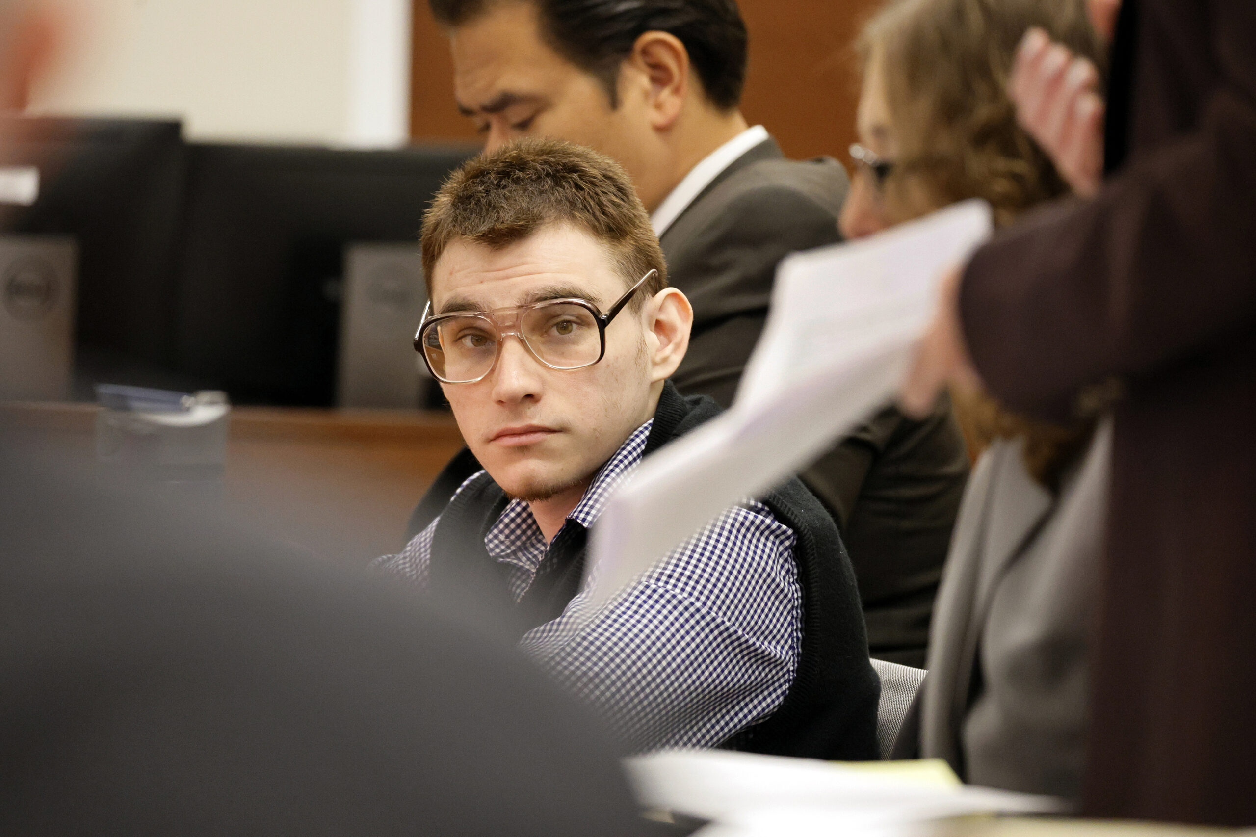 The gunman, Nikolas Cruz, at the defense table in court in 2022. (Carline Jean/South Florida Sun-Sentinel via AP, Pool, File)