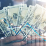 Business investment and stock market, Businessman holding dollars banknotes in hands, Economic growth, Currency exchange, Business financial concept.