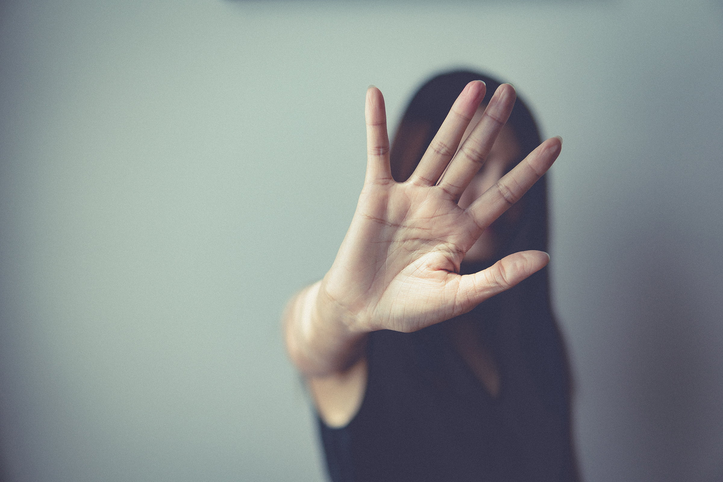 sexual abuse for women gender in society, a girl hand is stopping