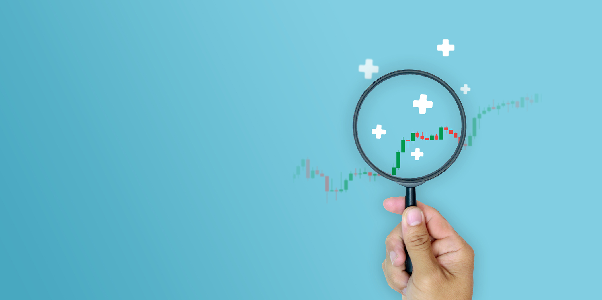 Financial growth, investment analysis, profit growth, and positive economic outlook assessment. Hand holding magnifying glass to focus on bullish candlestick chart with plus sign on blue background.