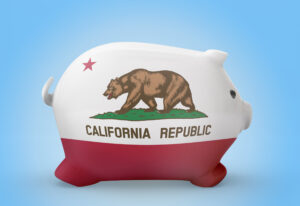 Side view of a piggy bank with the flag design of California.(series)