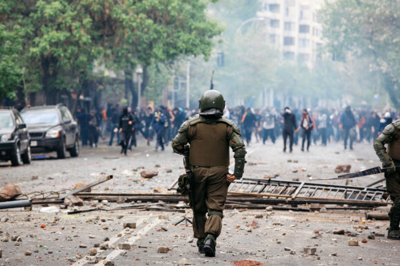 Riot police during a student strike in Santiago, Chile.