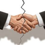 Business partnership breaking apart with cracked handshake illustration.