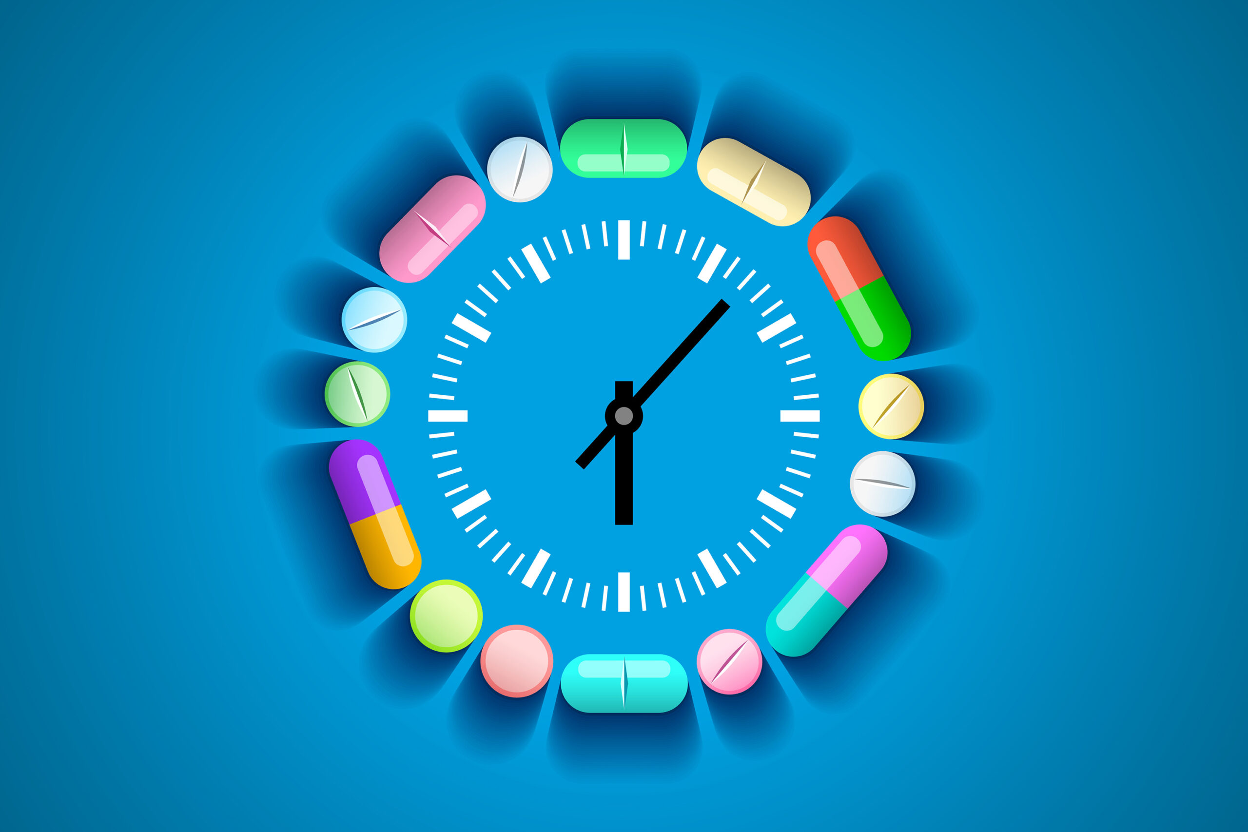 Clock and pills and tablets around it. Concept of taking medications by time, treatment schedule. Healthcare and medical concept