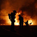 Silhouette of firefighters