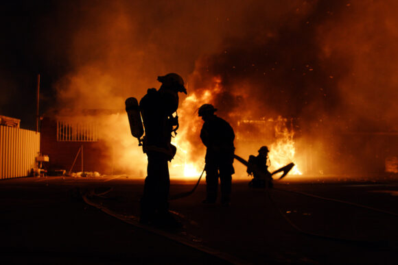 Silhouette of firefighters