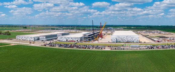 Aerial view of the construction of a massive AI data center campus with 400 million square feet hosting and 600MW capacity in Hutto Texas