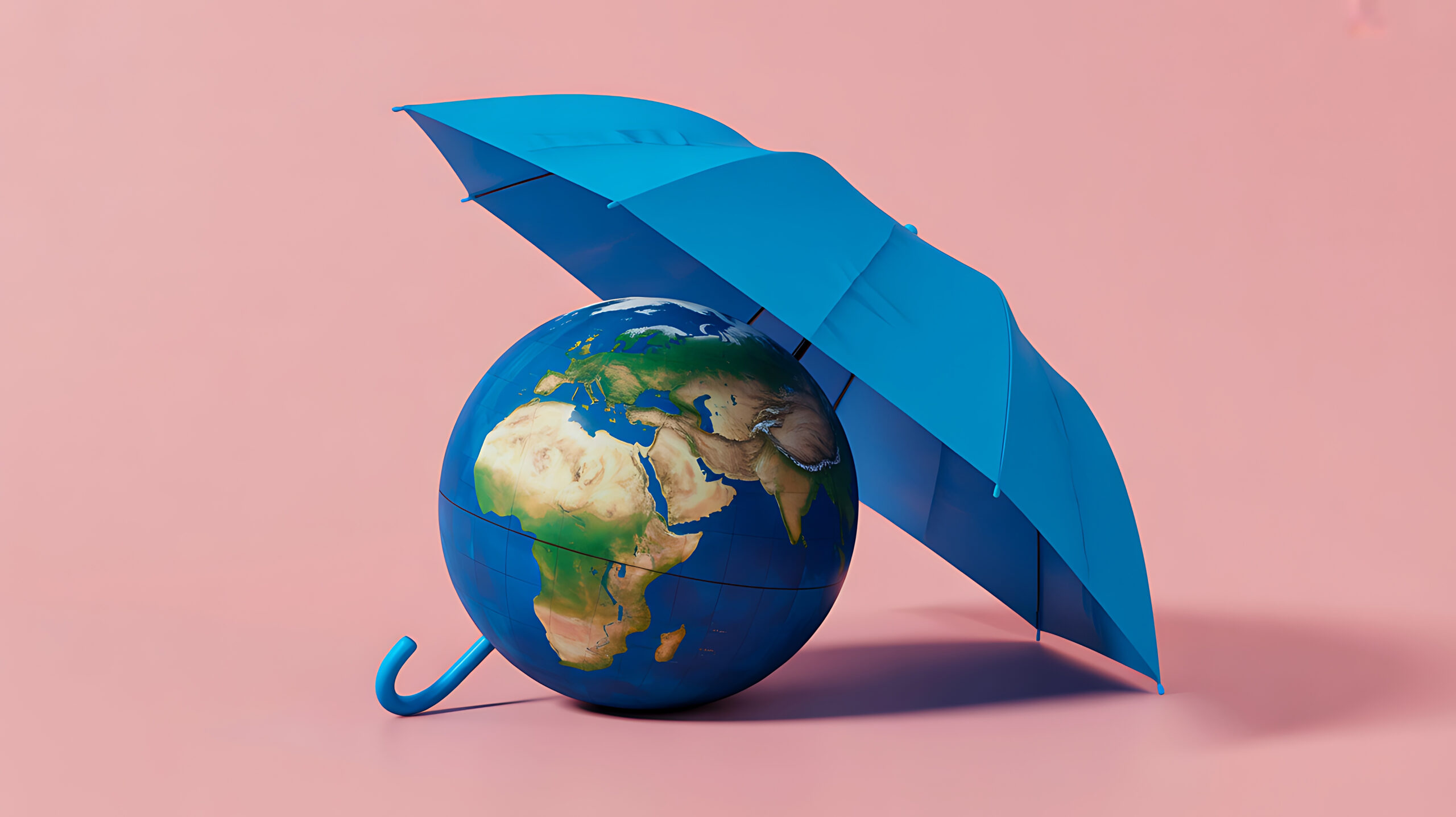 Earth globe protected by blue umbrella symbolizing climate protection