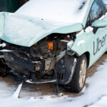 Kyiv, Ukraine. January 12, 2024. Wrecked car of Uber taxi after
