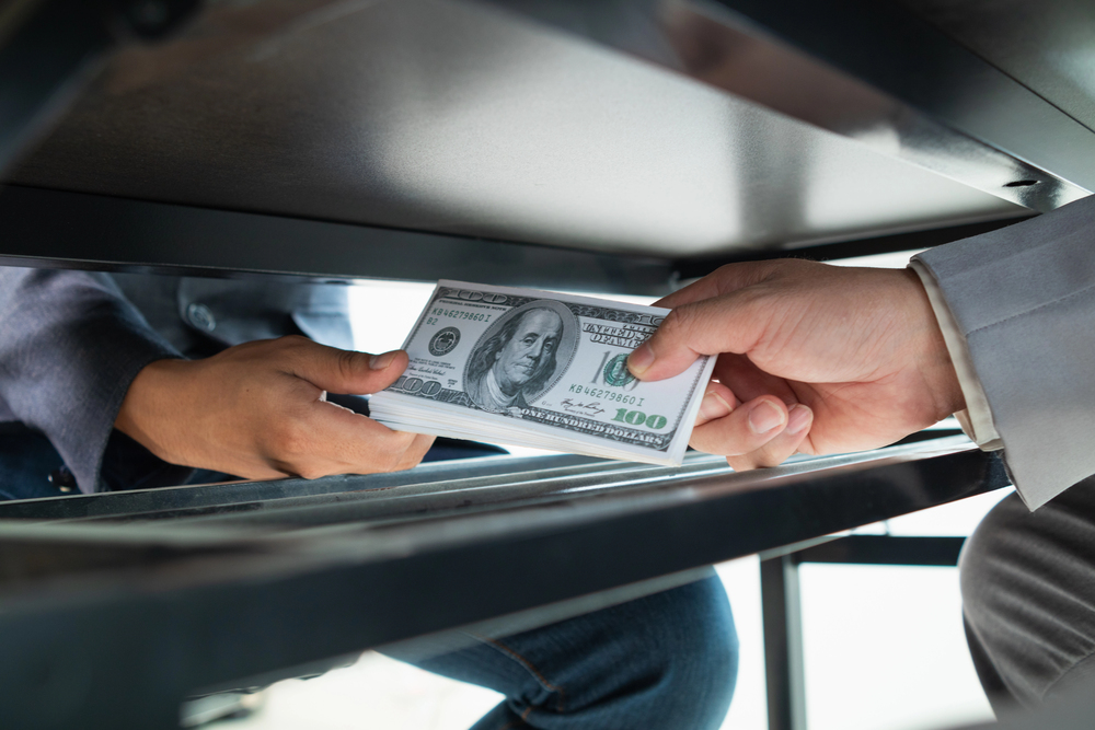 Florida Condo Manager, Contractor Charged in Alleged $186,000 Kickback Scheme
