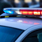 Detail view of illuminated police lights.