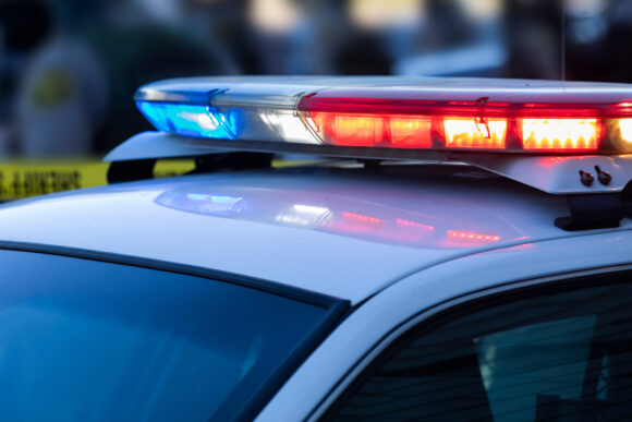 Detail view of illuminated police lights.