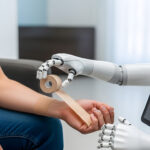 A humanoid robot carefully applies a bandage to a person's arm,