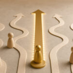 game pieces on a table with winding arrows symbolizing multiple paths to move forward
