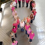 Higginbotham employees wear pink in support of Breast Cancer Awareness Month.