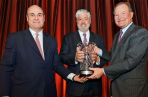 AIG Property Casualty CEO Peter Hancock, AIG CEO Robert Benmosche and former MMC CEO Brian Duperreault at the award dinner.