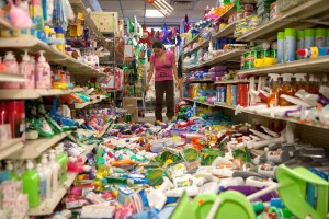 Winemaker Tom Montgomery walks through wine to see the damage following an earthquake at the B.R. Cohn Winery barrel storage facility Sunday in Napa, Calif. (AP Photo/Eric Risberg)