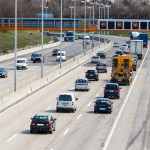 cars on a highway with a speed limit icon photos of transport, m